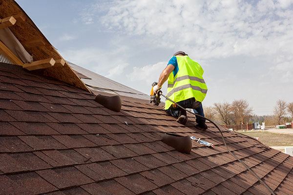 Man Fixing Roof